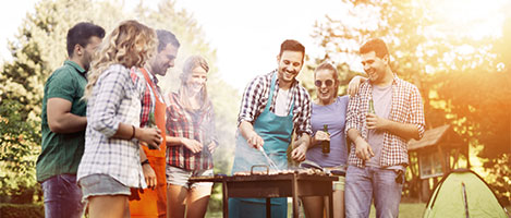 Friends having a BBQ in the park